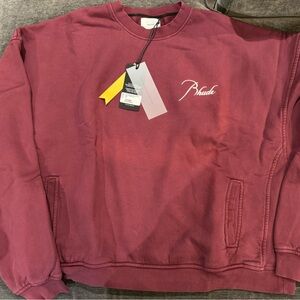 RHUDE Burgundy Crewneck Sweatshirt with pockets.